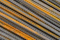 Steel rods or bars used to reinforce concrete,