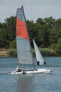 catamaran sailing on the lake of reiningue Royalty Free Stock Photo