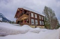 Reinli, Norway - March 26, 2018: Outdoor view of taditional Norwegian mountain houses of wood covered with snow in