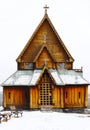 Reinli Stave Church ( stavkirke ) covered in a little bit of snow