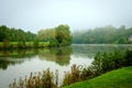 In the morning mist, the river Meuse flows through the Ardennes. Royalty Free Stock Photo