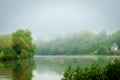 In the morning mist, the river Meuse flows through the Ardennes. Royalty Free Stock Photo