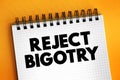 Reject Bigotry text on notepad, concept background