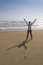 Rejoicing at beach Royalty Free Stock Photo