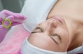 Rejuvenating facial gas liquid treatment. Woman getting face peeling procedure in a beauty SPA salon Royalty Free Stock Photo