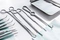 Rejuvenation by plastic surgery: medical instruments on white table backgrond