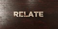 Relate - grungy wooden headline on Maple - 3D rendered royalty free stock image