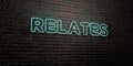 RELATES -Realistic Neon Sign on Brick Wall background - 3D rendered royalty free stock image Royalty Free Stock Photo