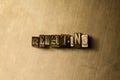 RELATING - close-up of grungy vintage typeset word on metal backdrop Royalty Free Stock Photo