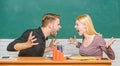 Relations classmates. Students communicate classroom chalkboard background. Violence and bullying. Communication between