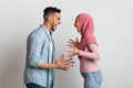 Relationship Crisis. Angry Islamic Spouses Shouting At Each Other With Rage Royalty Free Stock Photo