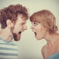 Angry woman and man yelling at each other Royalty Free Stock Photo