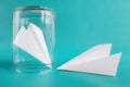 Relationship misunderstanding concept. Paper planes isolated on blue background. Copy space