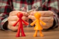 Relationship problems, colorful figurines on table with padlock. Conflict, crisis concept photo