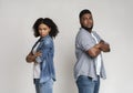 Relationship Problems. Upset Black Couple Standing Back To Back After Quarrel Royalty Free Stock Photo