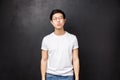 Relationship, romance and couple concept. Cute silly asian boyfriend close eyes and pouting lips prepared for first kiss Royalty Free Stock Photo