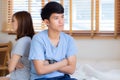 Relationship of young asian couple having problem on bed in the bedroom at home Royalty Free Stock Photo