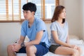 Relationship of young asian couple having problem on bed in the bedroom at home Royalty Free Stock Photo