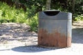 Black Public Garbage Can in a Park in Helsinki, Finland Royalty Free Stock Photo