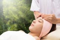 Relax beautiful asian woman facial receiving massage Royalty Free Stock Photo