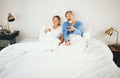 Relax, bedroom or senior couple watching tv or streaming movies via subscription on holiday together. Happy, television Royalty Free Stock Photo