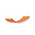 Relax colorful red yellow textile hammock on beach Royalty Free Stock Photo