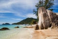 Rocks on white sand Sairee beach at Koh Tao, Thailand