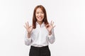 Relax, everything okay. Cheerful and carefree asian woman say no problem, make ok gesture and smiling, assure everything