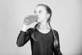 Relax after gym workout of teen girl. Resting time. Childhood activity. Sport and health. Little girl drink water from