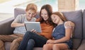 Relax, happy and tablet with mother and children on sofa for streaming, internet and social media app. Smile Royalty Free Stock Photo