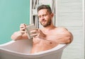 Relax at home. Total relaxation. Personal hygiene. Nervous system benefit bathing. Relax concept. Man muscular torso Royalty Free Stock Photo