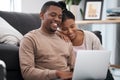 Relax, laptop and couple on floor for internet, search and social media entertainment in their home. Love, black family