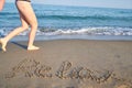 Relax message on the beach sand and woman ran - vacation and travel concep