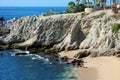 Beach blue green water ocean view at rocky cliff at california los cabos mexico nice hotel restaurant with fantastic views Royalty Free Stock Photo