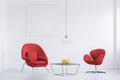 Relax room with red armchairs Royalty Free Stock Photo