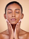 Relax, skincare or natural woman with wellness, beauty or facial glow with dermatology cosmetics in studio. Hands Royalty Free Stock Photo