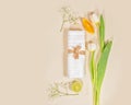 Relax, spa composition with white towel, tulips and citrus fruits on light background Royalty Free Stock Photo