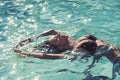 Relax in spa swimming pool, refreshment and skincare. Summer vacation and travel to ocean. Sexy woman on Caribbean sea