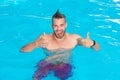 Relax in spa swimming pool. Summer men - excited. Beautiful young man relaxing on beach. Beach Clubs in Ibiza. Travel Royalty Free Stock Photo