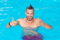 Relax in spa swimming pool. Summer men - excited. Beautiful young man relaxing on beach. Beach Clubs in Ibiza. Travel Royalty Free Stock Photo