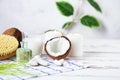 Relax and spa theme. Coconut, coconut oil, milk, candles, massage brush Royalty Free Stock Photo