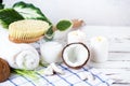 Relax and spa theme. Coconut, coconut oil, milk, candles, towel ,massage brush Royalty Free Stock Photo