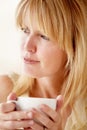 Relax, thinking and woman with coffee, ideas and daydreaming with inspiration, decision and weekend break. Person, home