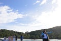 Relax time, tourists walking plastic pontoon to the beach Royalty Free Stock Photo