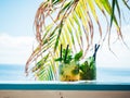 Relax time with two glasses of cold mojito cocktail put on a blue table on the beach Royalty Free Stock Photo