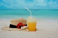 Relax on a tropical island, concept. Protection from sun and heat. Straw hat and pineapple juice. Royalty Free Stock Photo