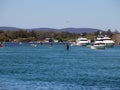 relax view of Houses and Boat Sheds amongst the trees on foster River on Sydney Central Coast NSW Australia