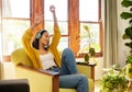 Relax, woman and headphones music in living room for feel good listening leisure in Cancun home. Happy Mexican girl Royalty Free Stock Photo