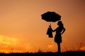 Relax Woman and shopping bags in sunset silhou