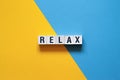 Relax - word concept on cubes Royalty Free Stock Photo